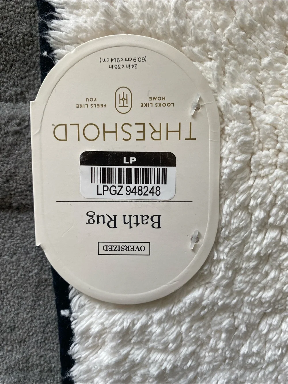 NWT Threshold Ivory and black border Bath Rug